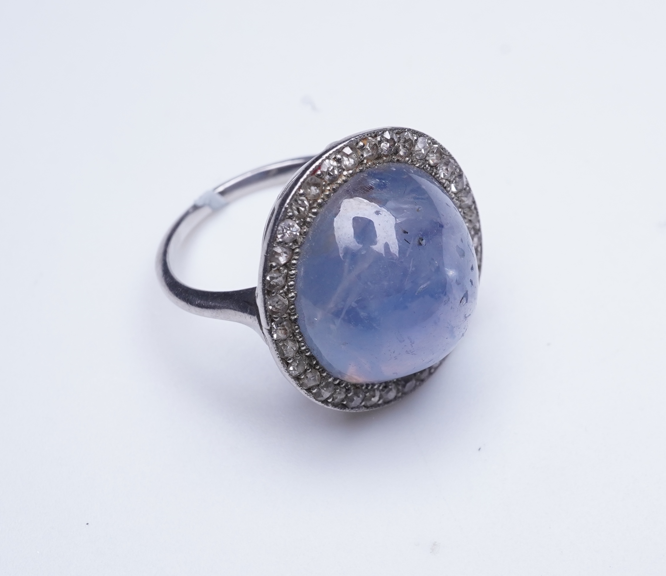 A star sapphire and diamond ring, early 20th century